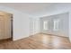 Bedroom with light hardwood floors and closet at 6475 S Dayton St # 102, Englewood, CO 80111