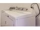 A white Maytag washer and dryer set at 6475 S Dayton St # 102, Englewood, CO 80111