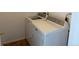 Laundry area featuring Maytag washer and dryer set at 6475 S Dayton St # 102, Englewood, CO 80111