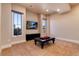 Bedroom features two large windows and a mounted television, offering ample natural light at 8002 Galileo Way, Littleton, CO 80125