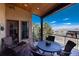 Inviting outdoor patio with comfortable seating, scenic views, and stylish decor at 8002 Galileo Way, Littleton, CO 80125