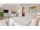 Spacious main bedroom with a ceiling fan and a large window at 1563 N Lafayette St, Denver, CO 80218