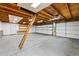 Spacious garage with ample storage, ladder to attic, and multiple bays at 1563 N Lafayette St, Denver, CO 80218