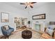 Cozy living room with fireplace, hardwood floors, and a comfortable seating area at 1563 N Lafayette St, Denver, CO 80218