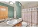 Clean bathroom with shower/tub combo and updated vanity at 23405 E Elmhurst Pl, Aurora, CO 80016