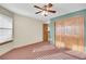 Bright bedroom with ceiling fan and double door closet at 23405 E Elmhurst Pl, Aurora, CO 80016