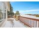 Deck with snowy view of a golf course and houses at 23405 E Elmhurst Pl, Aurora, CO 80016