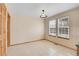 Bright dining area with tile floors and neutral walls at 23405 E Elmhurst Pl, Aurora, CO 80016