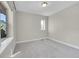 Bright bedroom with neutral carpet and ample natural light from two windows at 11150 E 26Th Ave, Aurora, CO 80010