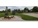 Community basketball court and seating area at 458 Whitetail Cir, Lafayette, CO 80026