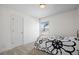 Cozy bedroom with neutral decor and window at 458 Whitetail Cir, Lafayette, CO 80026