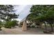 Covered picnic area with tables under a curved roof at 458 Whitetail Cir, Lafayette, CO 80026