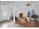 Bright living room with hardwood floors, high ceilings, and lots of natural light at 458 Whitetail Cir, Lafayette, CO 80026