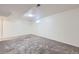 View of the basement area featuring neutral walls, carpet, a window, and a ceiling vent at 110 E 104Th Pl, Northglenn, CO 80233