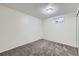 Clean basement room with neutral carpeting and a bright window offering natural light at 110 E 104Th Pl, Northglenn, CO 80233