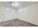 Basement area featuring neutral walls, carpet, and two windows providing natural light at 110 E 104Th Pl, Northglenn, CO 80233