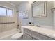 Well-maintained bathroom with tiled shower-tub combo, updated vanity, and modern fixtures at 110 E 104Th Pl, Northglenn, CO 80233