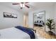 Comfortable bedroom featuring hardwood floors, mirrored closet doors, and a neutral color scheme at 110 E 104Th Pl, Northglenn, CO 80233