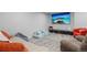 Basement featuring carpet, a large television, and plenty of seating for a relaxing movie night at 12491 E 106Th Pl, Commerce City, CO 80022