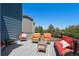 Relaxing outdoor deck featuring comfortable seating arrangement for enjoying the views and open air at 12491 E 106Th Pl, Commerce City, CO 80022