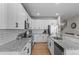 Bright modern kitchen featuring stainless steel appliances and granite countertops at 12491 E 106Th Pl, Commerce City, CO 80022