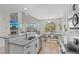 Open-concept kitchen with granite countertops, tile backsplash, and stainless steel appliances at 12491 E 106Th Pl, Commerce City, CO 80022