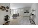 Open living area with a stone fireplace, tasteful decor, and comfortable seating for relaxation and entertaining at 1345 Witter Gulch Rd, Evergreen, CO 80439