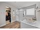 Modern bathroom featuring a glass shower, soaking tub, and a walk-in closet at 199 Simmental Loop, Castle Rock, CO 80104
