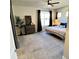 Spacious bedroom with soft carpet, ceiling fan, and abundant natural light at 199 Simmental Loop, Castle Rock, CO 80104