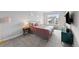 Charming bedroom with a comfortable bed, side table, and a window with a neighborhood view at 199 Simmental Loop, Castle Rock, CO 80104