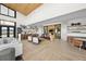 Spacious lounge area featuring stylish seating, a wet bar, and elegant decor for relaxing and entertaining guests at 199 Simmental Loop, Castle Rock, CO 80104