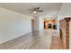 Spacious living room with wood burning fireplace and light wood floors at 1167 S Ceylon St, Aurora, CO 80017