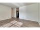 Open-concept living area with hardwood floors connected to the kitchen at 1167 S Ceylon St, Aurora, CO 80017