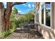 Enjoy outdoor dining on this wooden patio with a table and chair set at 1215 S Ogden St, Denver, CO 80210
