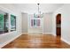 Elegant dining area featuring hardwood floors, natural light, and classic design at 1215 S Ogden St, Denver, CO 80210