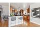 Beautiful kitchen featuring custom wood cabinetry, sleek countertops, and stainless steel appliances at 1215 S Ogden St, Denver, CO 80210