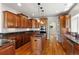 Spacious kitchen with granite countertops, stainless steel appliances, and custom cabinetry at 1215 S Ogden St, Denver, CO 80210