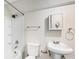 Bright bathroom with a shower/tub combination, vanity and toilet at 9735 E 112Th Pl, Commerce City, CO 80640