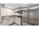 The kitchenette features modern appliances, sleek countertops, and ample cabinet space at 9735 E 112Th Pl, Commerce City, CO 80640