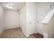 Entryway with tile floors, a closet and front door with a small rug at 767 Roslyn St # 20, Denver, CO 80230