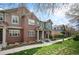 Charming brick townhome with well-maintained lawn and landscape at 767 Roslyn St # 20, Denver, CO 80230