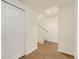 Tiled entry hall with closet and stairs to the second floor at 767 Roslyn St # 20, Denver, CO 80230