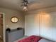 Bright bedroom offering a double closet and a dresser with decor at 1778 S Lee St, Lakewood, CO 80232