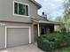 Charming exterior featuring a well-maintained front yard and attached garage at 1778 S Lee St, Lakewood, CO 80232