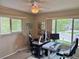 Bright office with large windows, ceiling fan, and comfortable work spaces at 1778 S Lee St, Lakewood, CO 80232