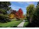 Community featuring paved trails and mature trees at 5951 E Irish Pl, Centennial, CO 80112
