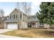 Charming two-story home with a two car garage and a beautifully landscaped front yard at 5951 E Irish Pl, Centennial, CO 80112