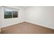Cozy bedroom with natural light and neutral carpet at 5372 W 68Th Ave, Arvada, CO 80003
