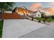 Beautiful home with a covered front porch, stone accents, and a well-maintained lawn and driveway at 5372 W 68Th Ave, Arvada, CO 80003