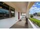 Inviting covered front porch with white railings and stone pillars at 5372 W 68Th Ave, Arvada, CO 80003
